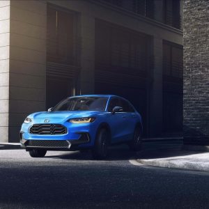 Honda HR-V Review image of a blue 2026 Honda HR-V parked curbside in a city setting