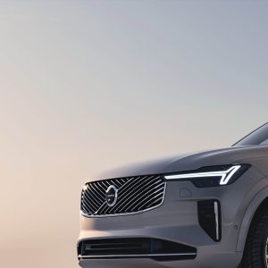 Close-up of the Volvo XC90 front grille and LED headlight, featured in our Volvo XC90 Review.